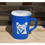 Blue ceramic round coffee mug with a corgi wearing sunglasses engraved on the front. Corgi Mug