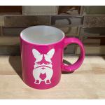 Pink ceramic round coffee mug with a corgi butt engraved on the front. Corgi Mug