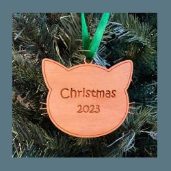 Wood cat head Christmas ornament with your choice of wood type, size and personalized text. Cat Ornament