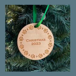 Laser cut round paw print wood Christmas ornament comes in 3 sizes and a variety of wood types. Dog Paw Ornament