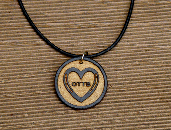 Custom engraved wood OTTB horseshoe heart design charm.