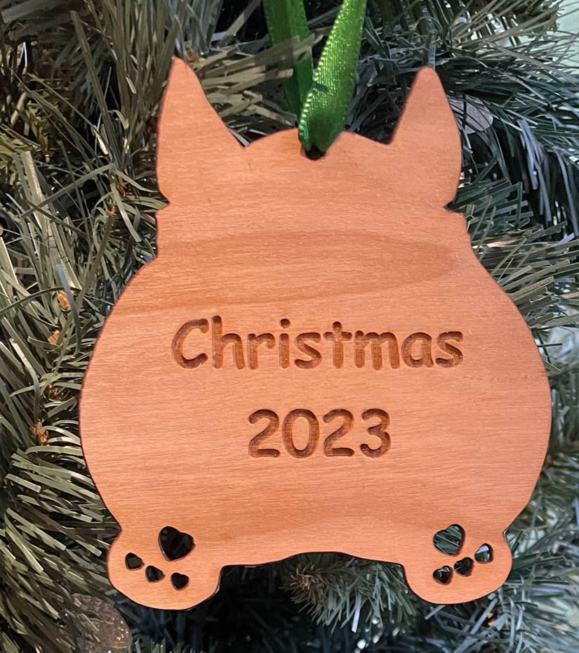 Cutout corgi butt wood ornament with custom engraved text. Corgi Ornament