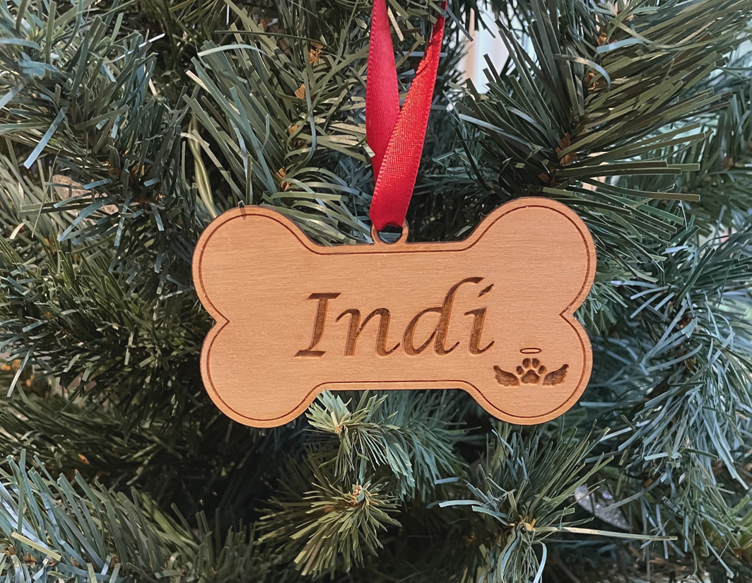 Laser cut dog bone memorial wood Christmas ornament comes in 3 sizes and a variety of wood types. Dog Memorial Ornament