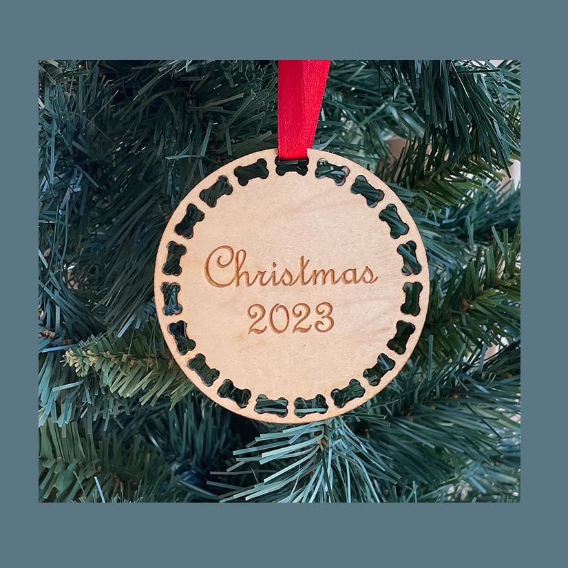 Round wood dog bone Christmas ornament with your choice of wood type, size and personalized text. Dog Bone Ornament