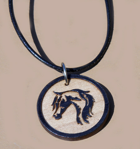 Engraved wood horse head design circle charm.