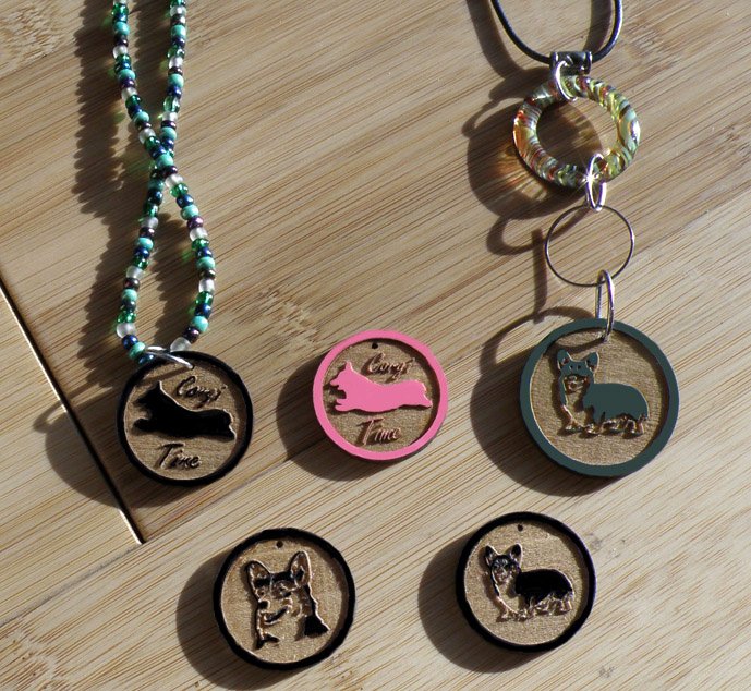 Engraved wood Welsh Corgi design circle charm.